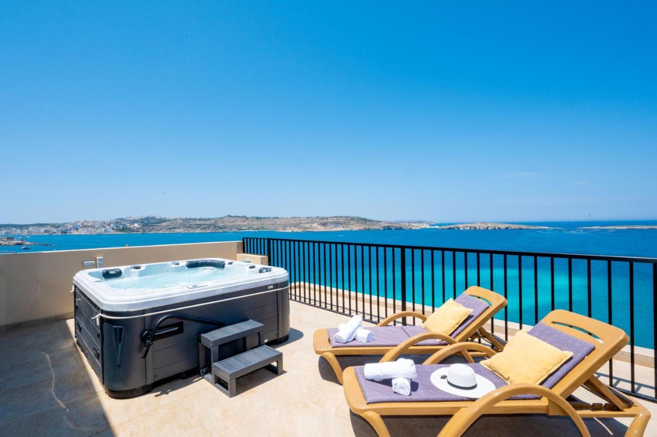 Islet Promenade Seafront Penthouse With Breathtaking Seaviews And Private Hot Tub On The Large Terrace By Getawaysmalta St Paul's Bay